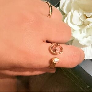 Gold Ring with Pale Pink Gemstone and Cream Floral Accent